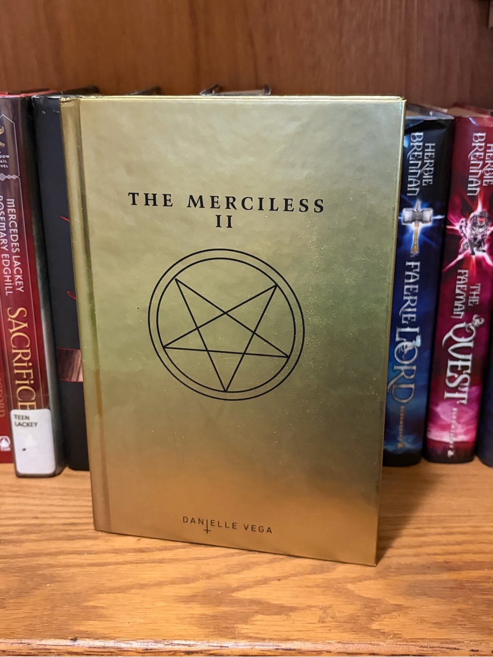 The Merciless II Gold Hardcover Book